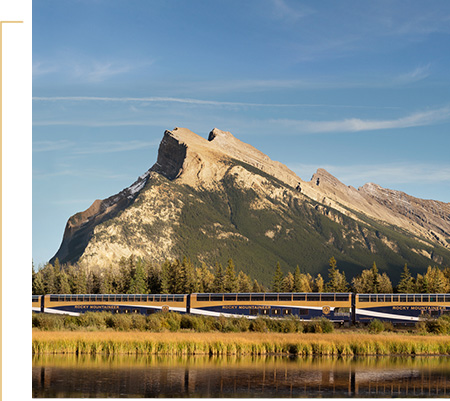 Rocky Mountaineer travelling past Vermilion Lake.