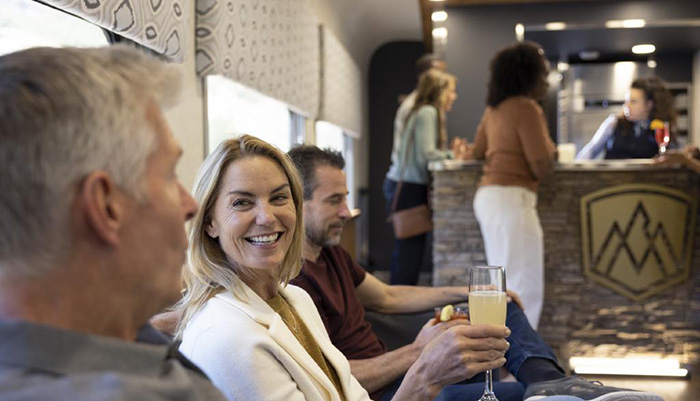 Guest enjoys a mimosa onboard the train.