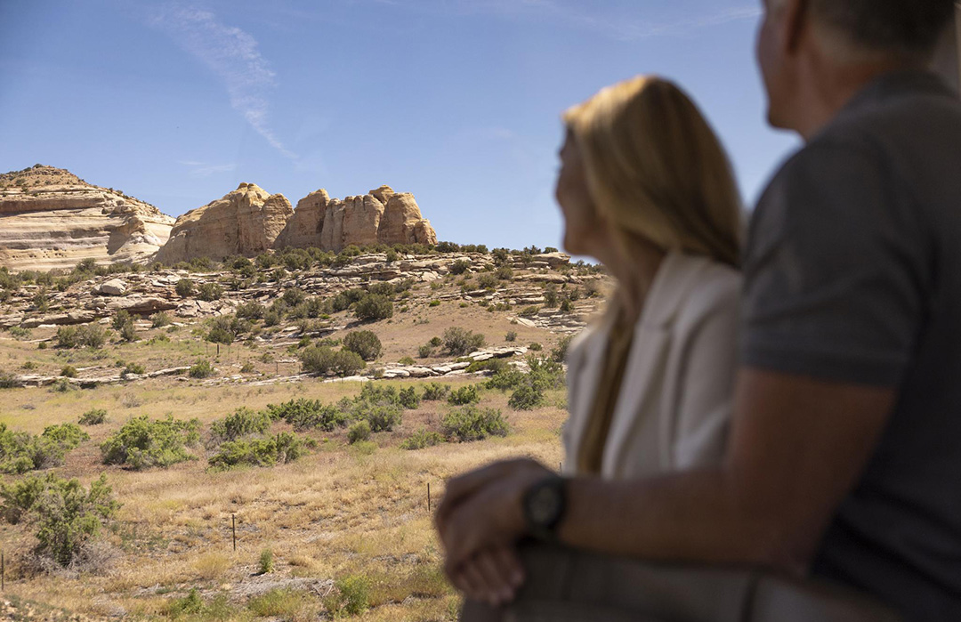 Couple admires views of Canyonlands National Park.