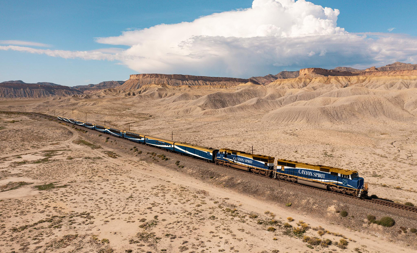 Canyon Spirit train travelling along Rockies to the Red Rocks route.