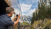 Guest takes photo from Outdoor Viewing Platform.