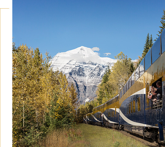 Rocky Mountaineer train with Mount Robson above.