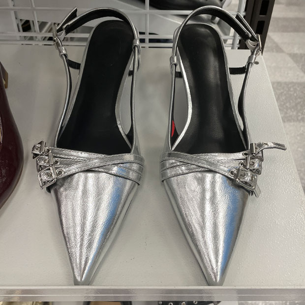 Pointy silver metallic shoes with buckle detail from Ross