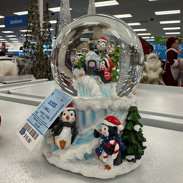 Snow globe with Penguins Playing found at Ross.