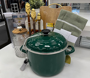 Cookware and kitchen tools in a Ross store.