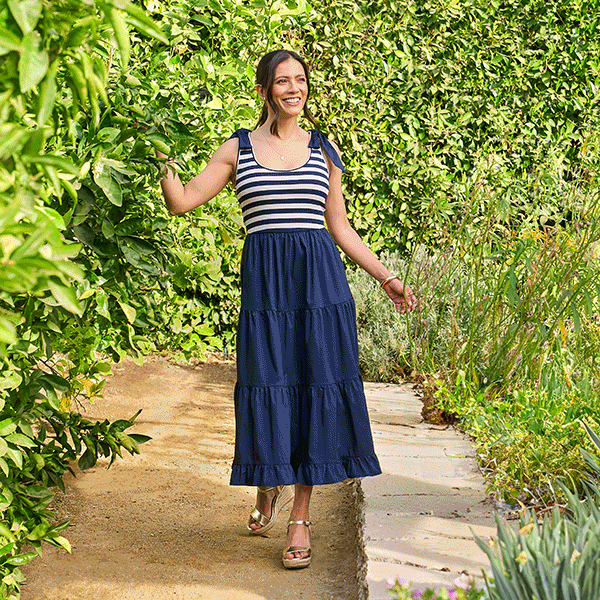 Women wearing navy striped tiered maxi dress and gold strappy heeled sandals, Women wearing green floral tiered maxi dress and white sandal heels, Women wearing lemon print ruffled shirt with white wide leg pants and gold strappy wedge heels from Ross