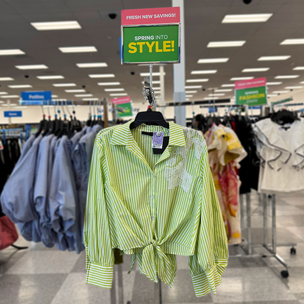 Long sleeve green striped top with white lace embellishments found in store at Ross. 