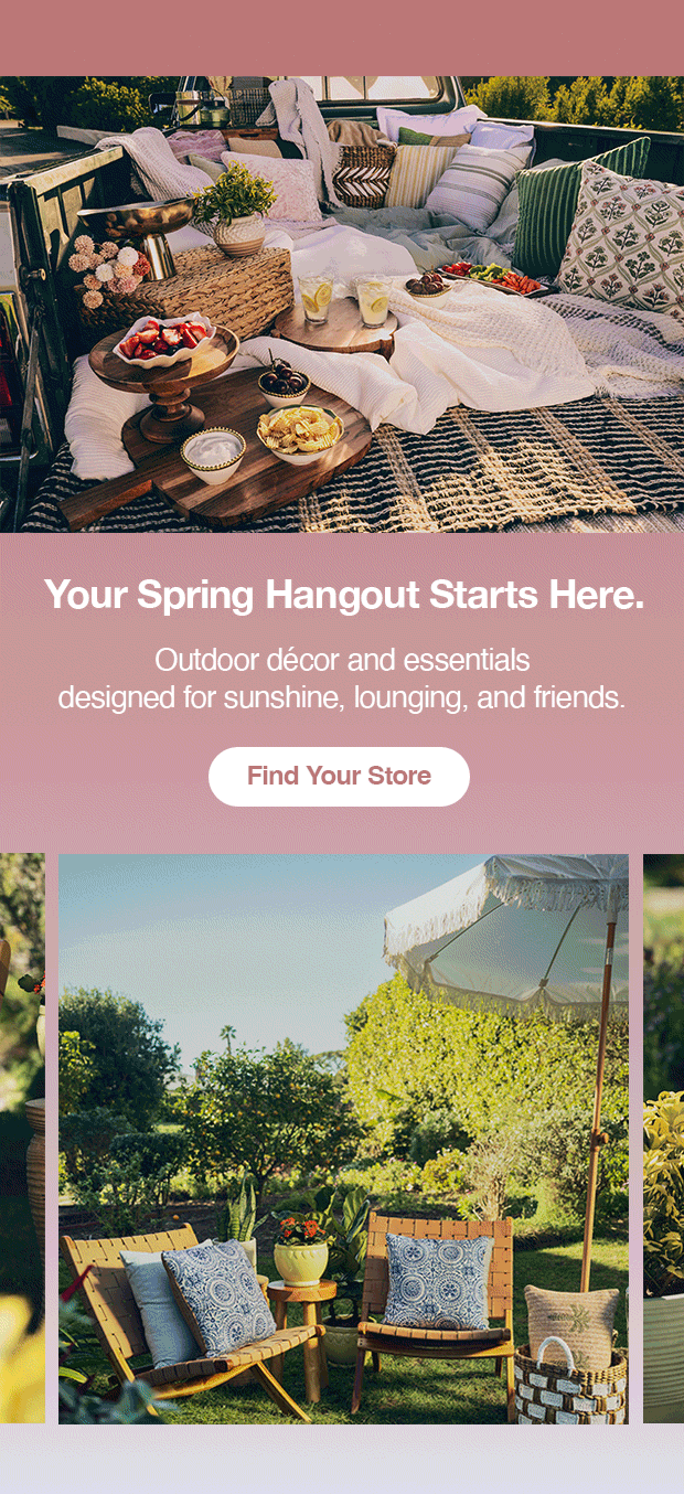 Outdoor patio setup with cushions, blankets, and shared food, styled for a relaxed spring gathering with friends. Find Your Store. 