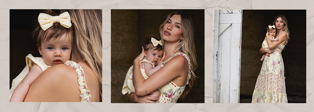 Baby and mother posing at the camera in summer dresses