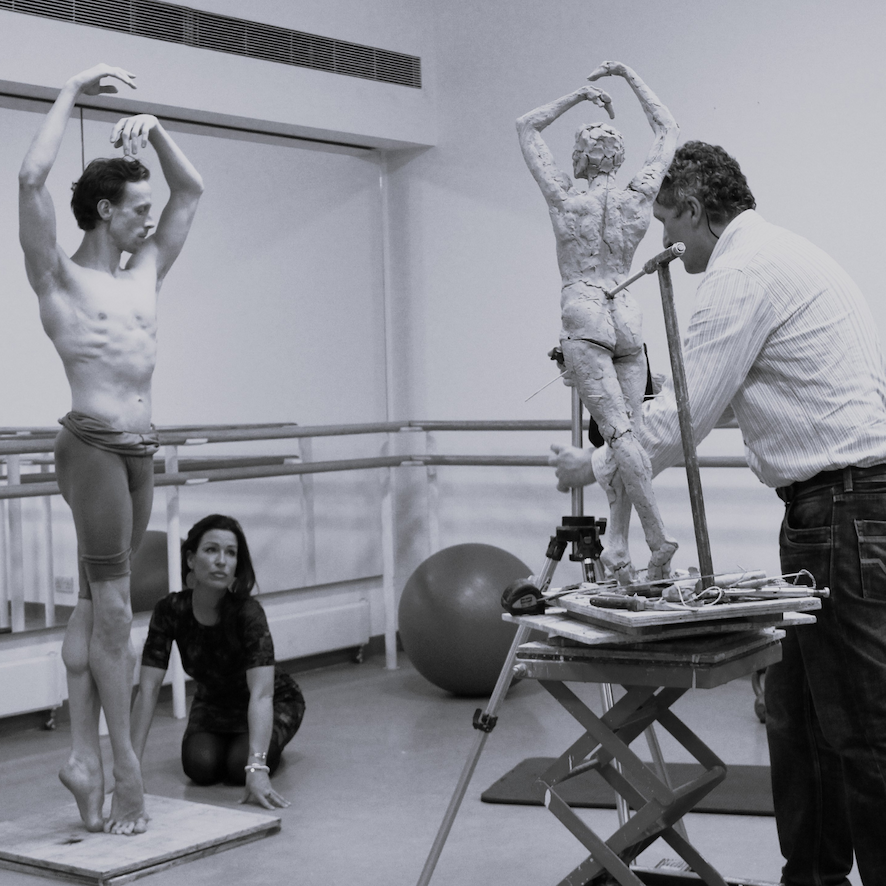 the artist sculpting from a live dancer