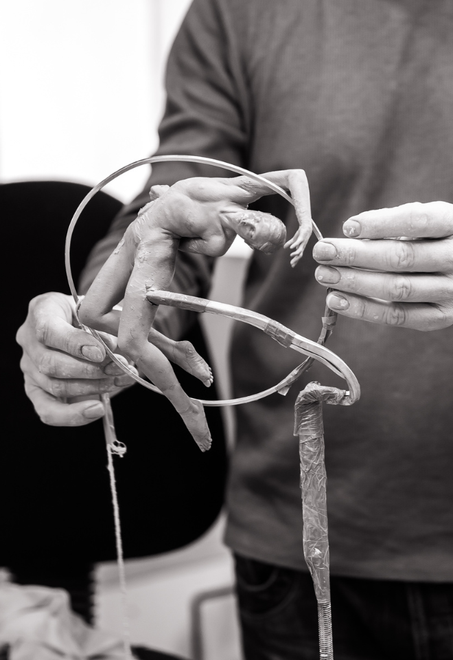 mid-process sculpture of a woman in a circle