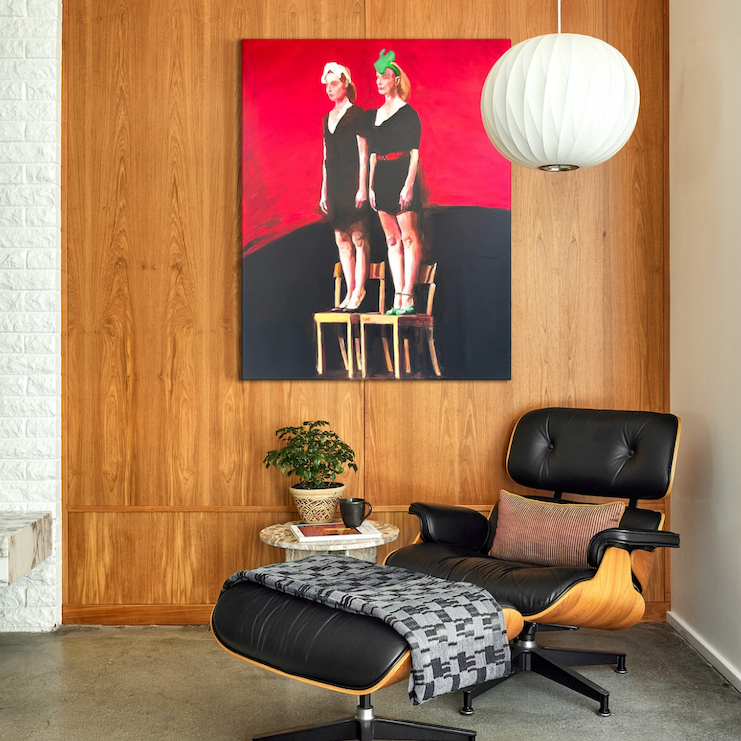 living room with red art