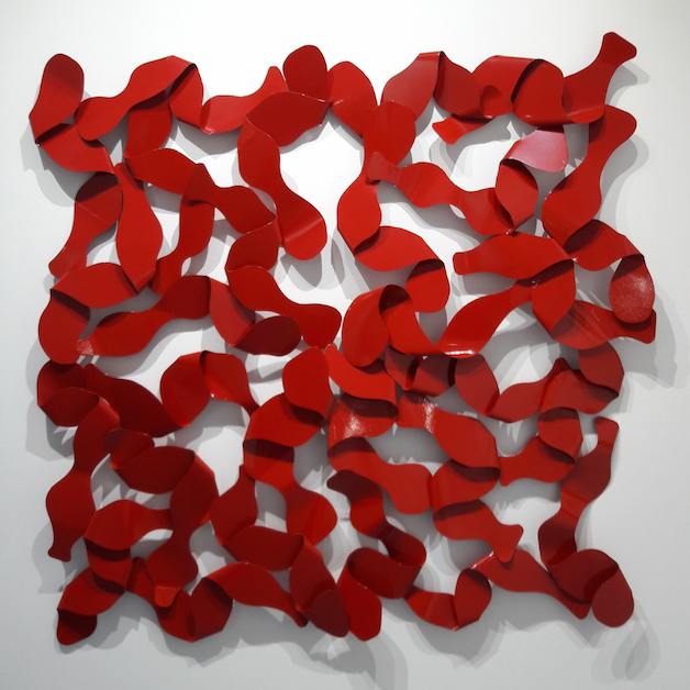red wall sculpture