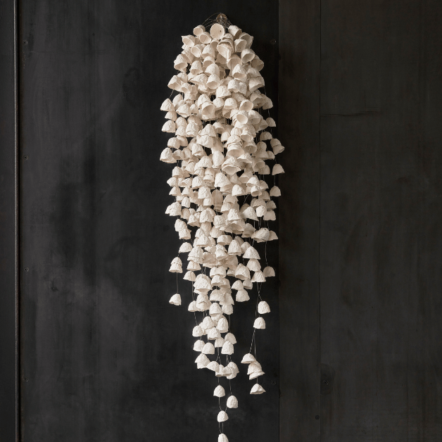 white hanging sculpture