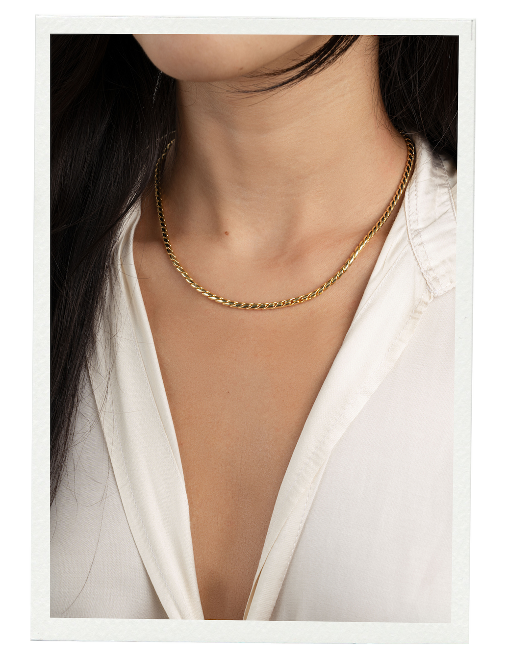 Model wearing gold chunky chain necklace