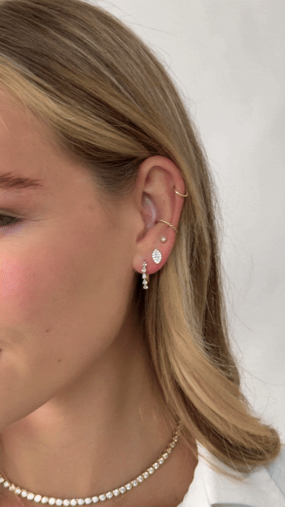new arrivals model wearing new earrings