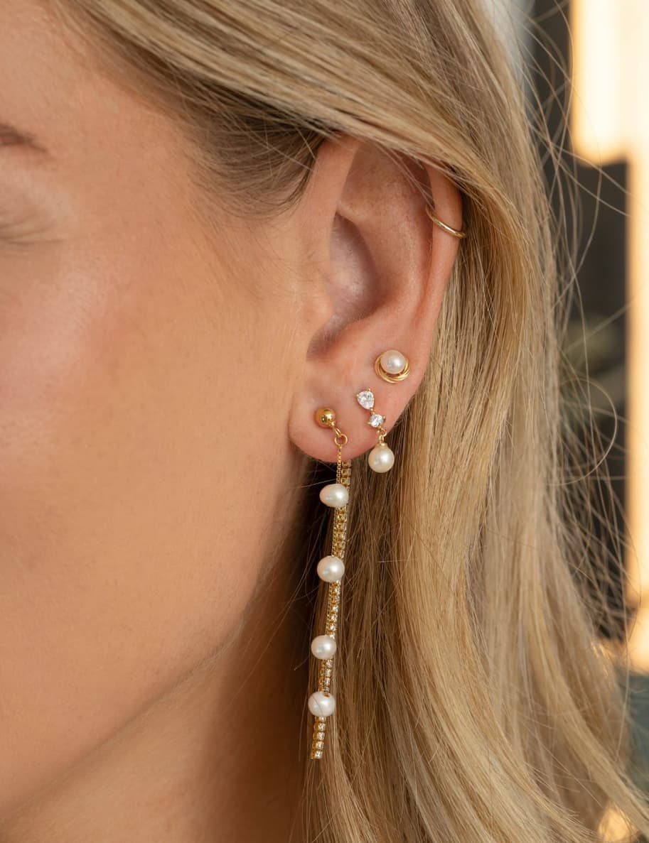 new arrivals model wearing new earrings