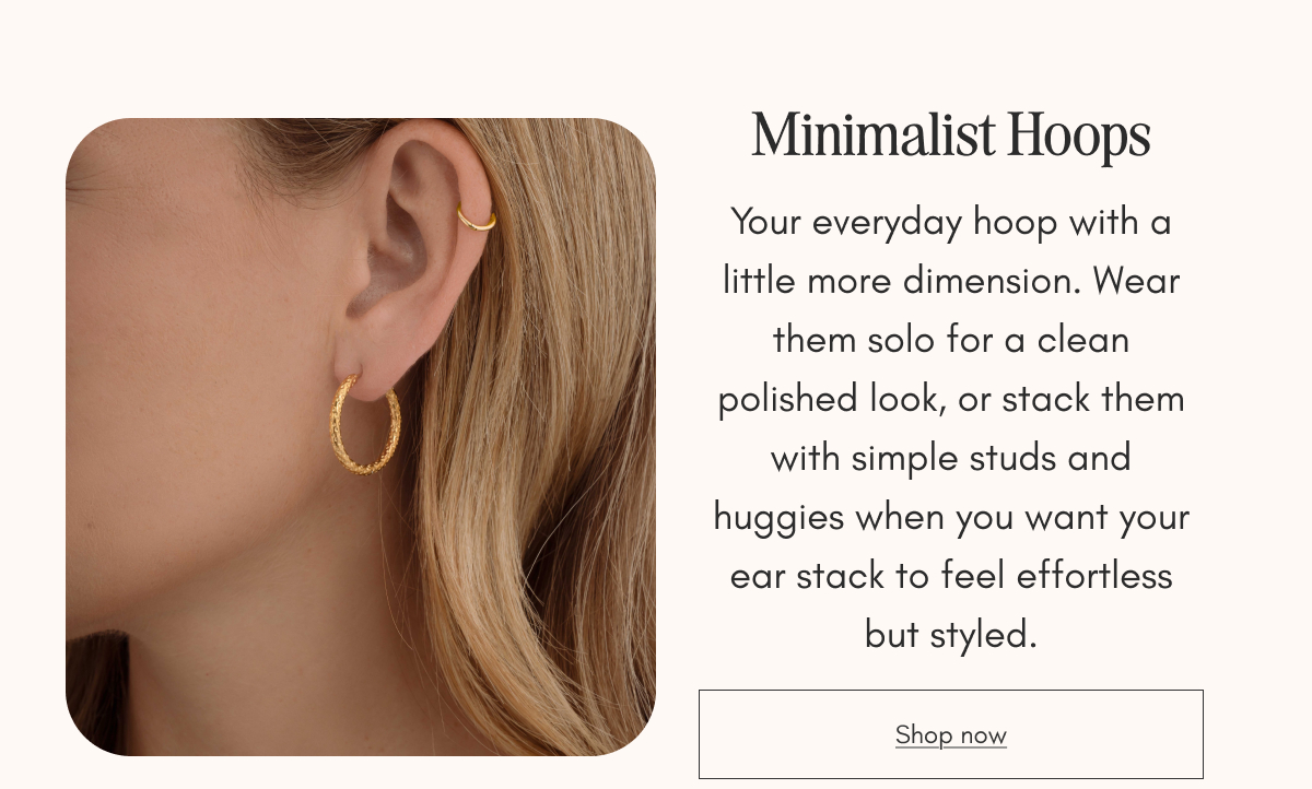 Minimalist Hoops product section featuring a close-up photo of small textured gold hoops worn in an ear, with product description and Shop now button