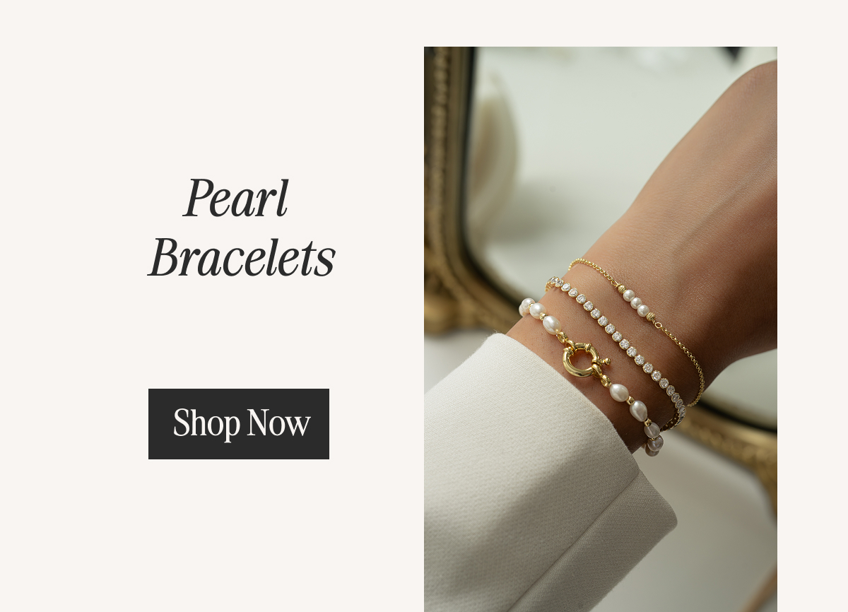 Pearl Bracelets - layered gold and pearl bracelet stack worn on wrist, shop now