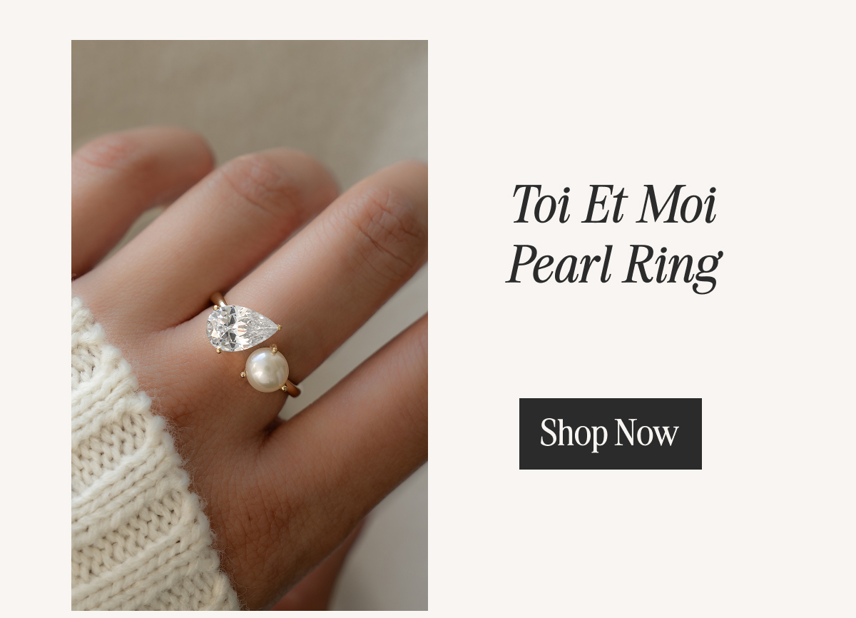 Toi Et Moi pearl ring with pear-shaped stone, worn on hand - shop now