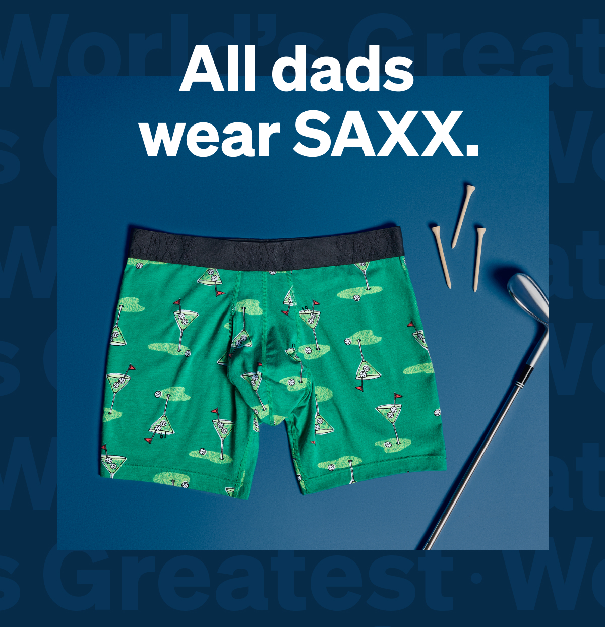 All dads wear SAXX. Green SAXX boxer briefs with a golf-inspired print, displayed alongside a golf club and tees as part of the Father’s Day collection.