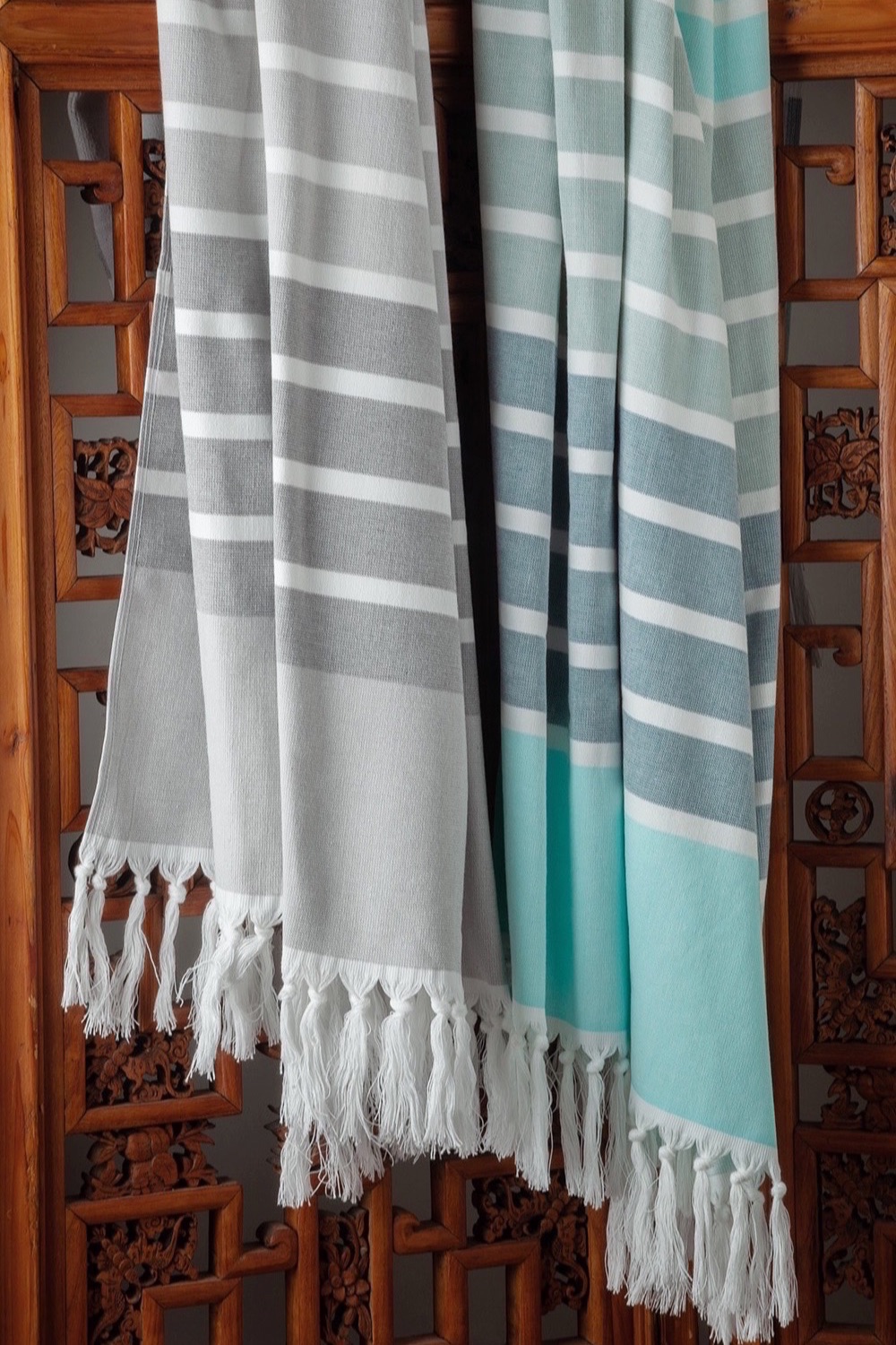 Ultra-light and luxurious, fringed beach towels.
