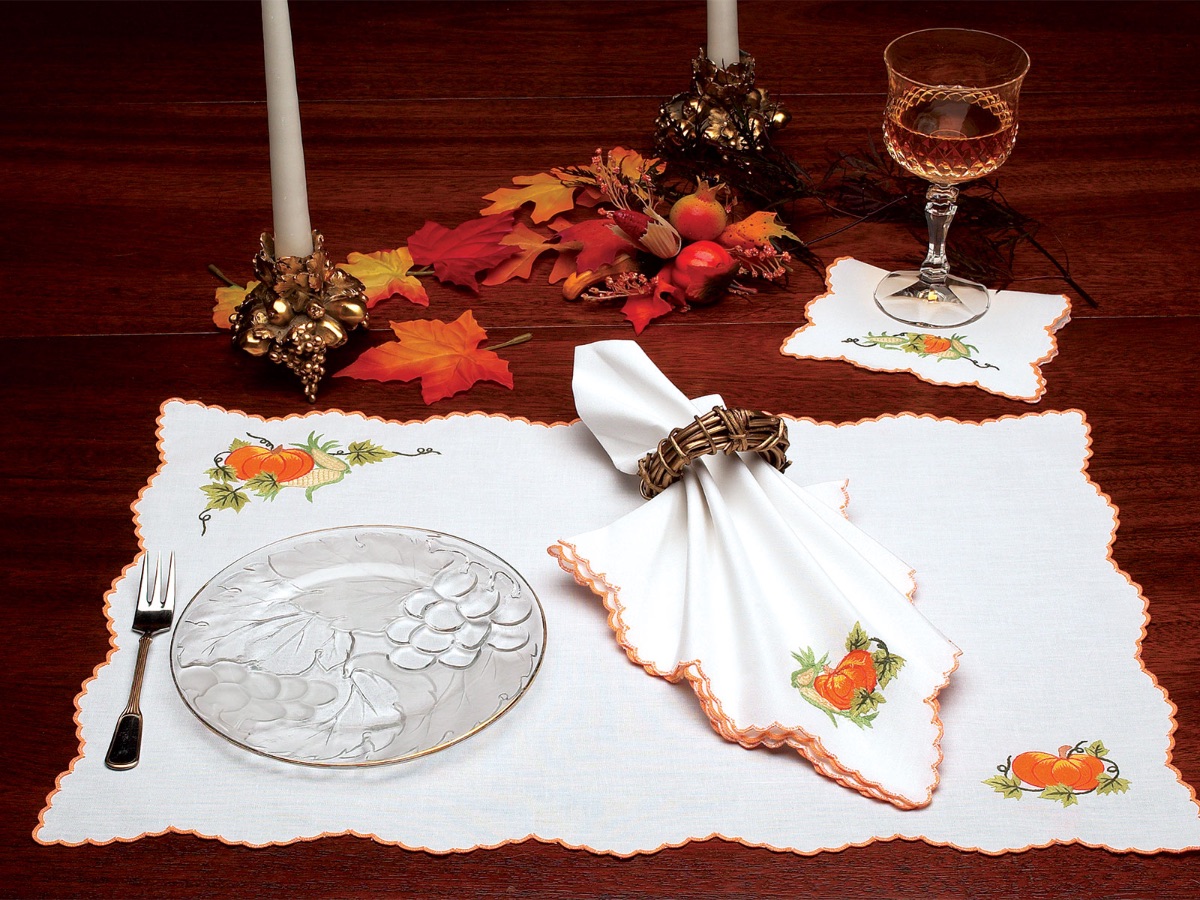 The abundant beauty of autumn is hand embroidered with exquisite care on luxurious 100% Italian Linen.