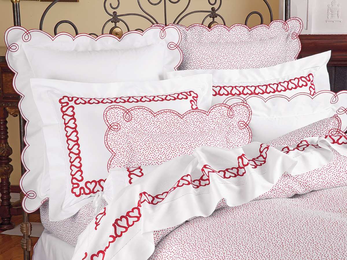 A chain of stylized hearts, embroidered on pure White 600tc Egyptian cotton sateen.