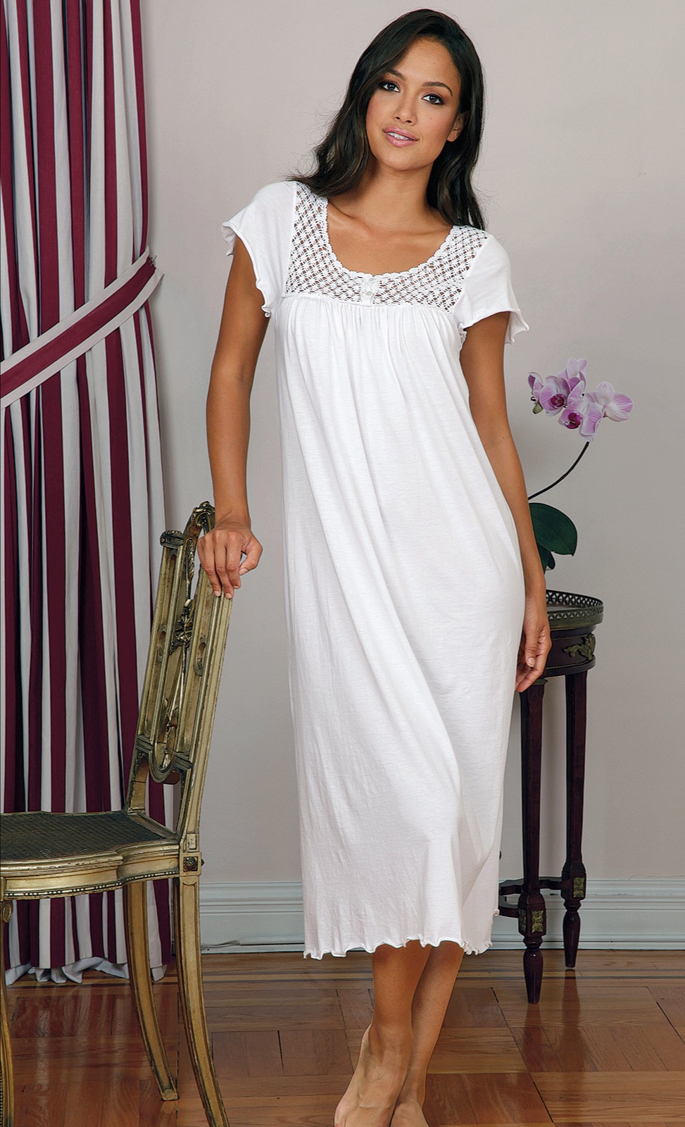 Made in Peru with hand crocheted detail, this gown exemplifies your refined style in all matters. 