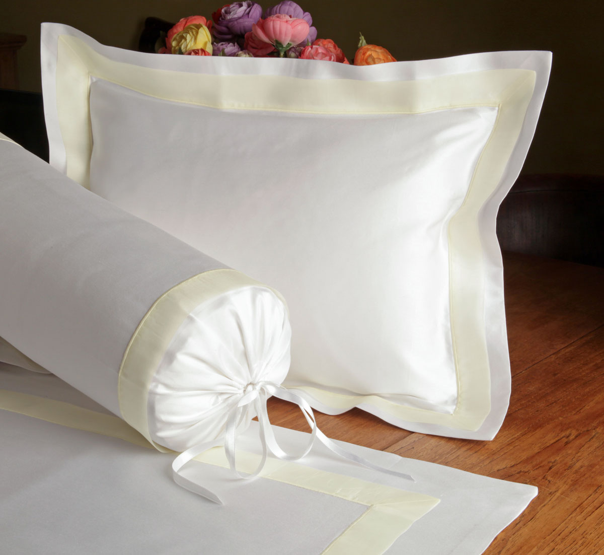Crème de la Crème, Made in Italy of Moonlight White, 1000 thread count, pure Egyptian cotton sateen, softly set off by overlay borders of gossamer Ivory silk voile on precisely flanged edges.