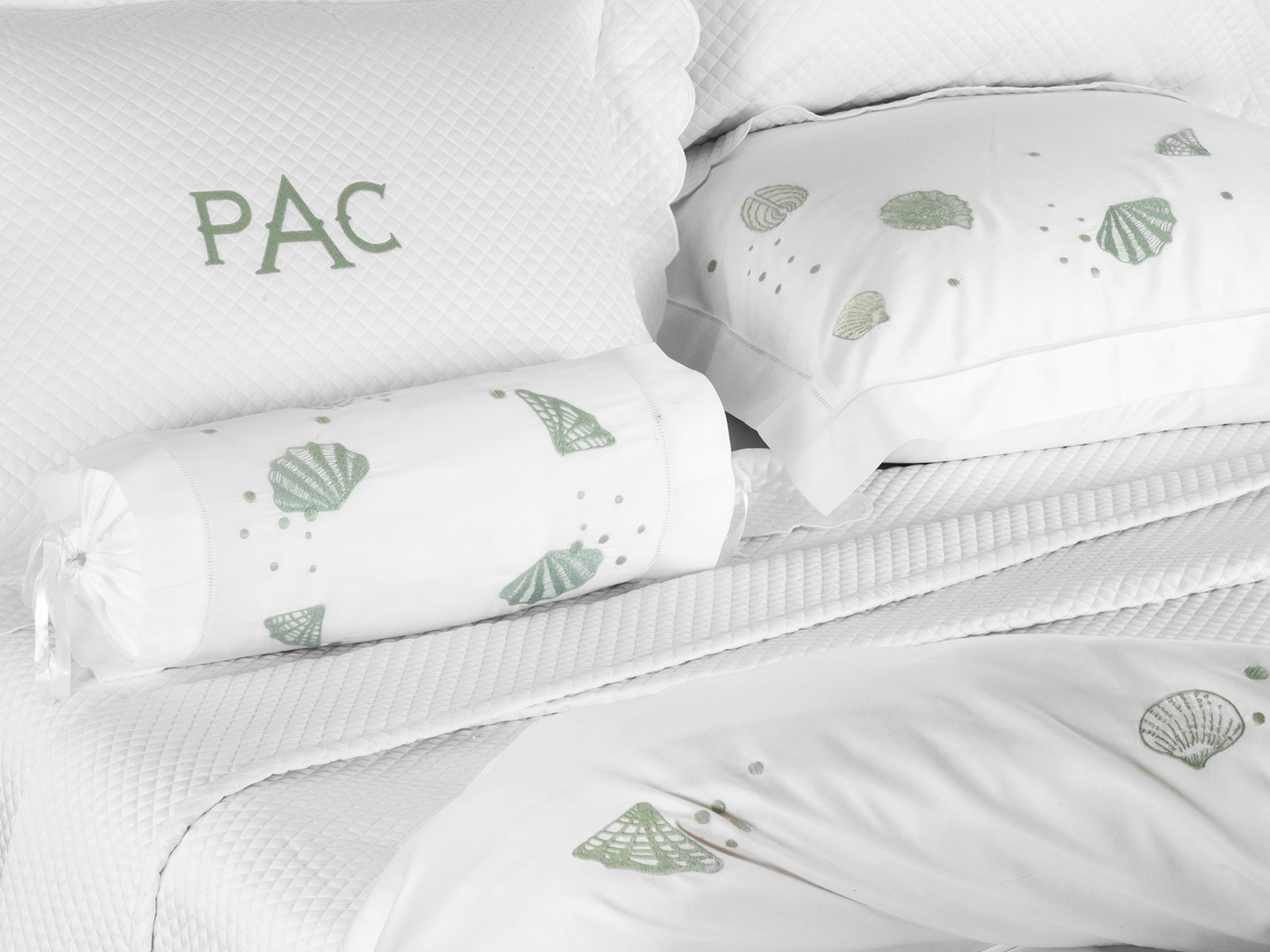 Surfside: Silky 600tc sateen with embroidered shell design in soft, pale Green tones.
