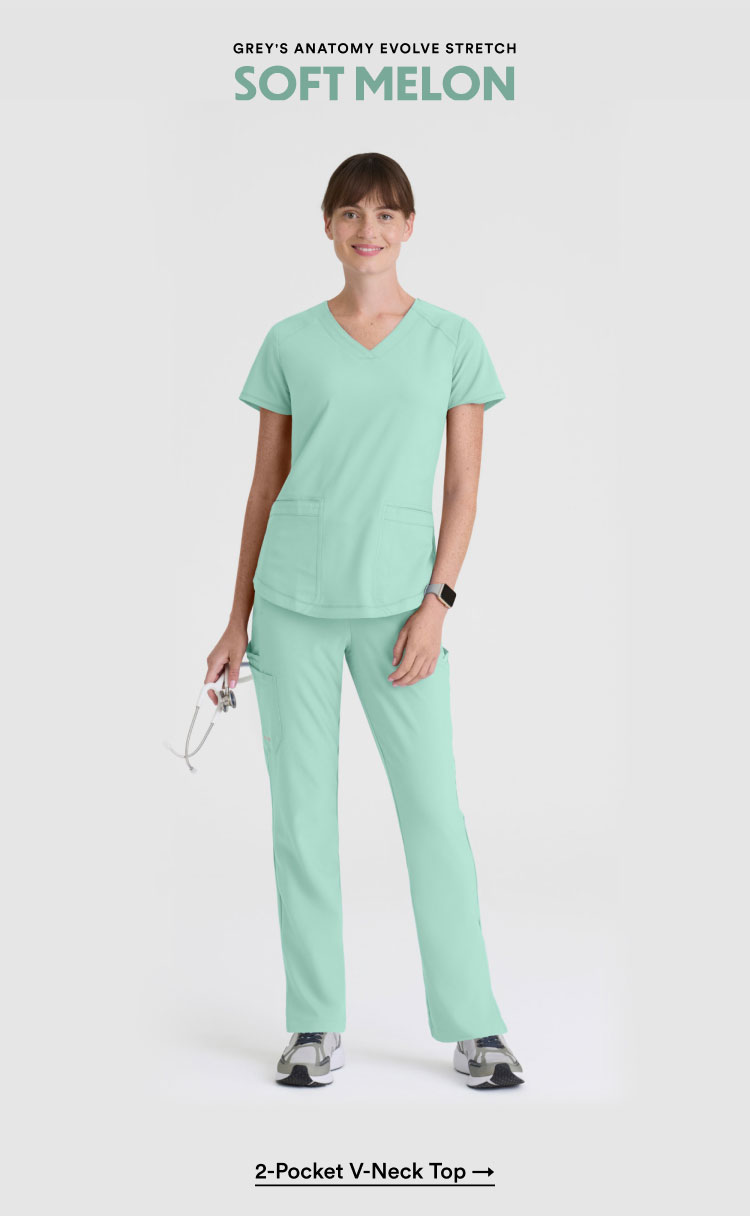 Grey's Anatomy Evolve Stretch | Soft Melon | 2-Pocket V-Neck Top | Shop Now