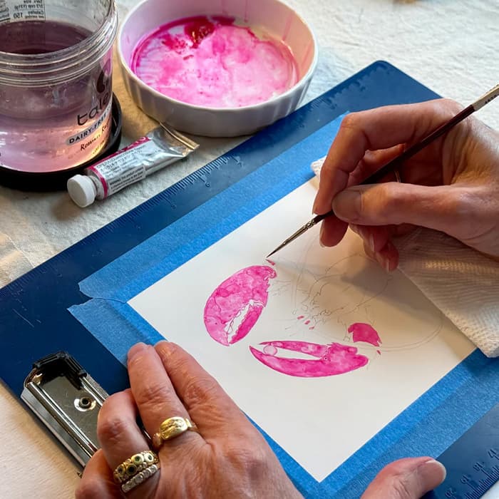 Valerie Paul painting the lobster