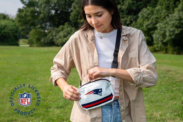 Lifestyle photo of woman wearing New England Patriots Belt Bag