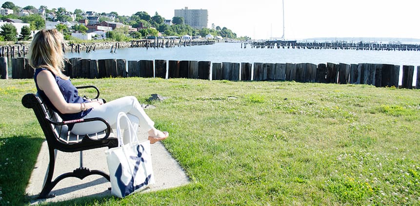 Woman sitting at bay