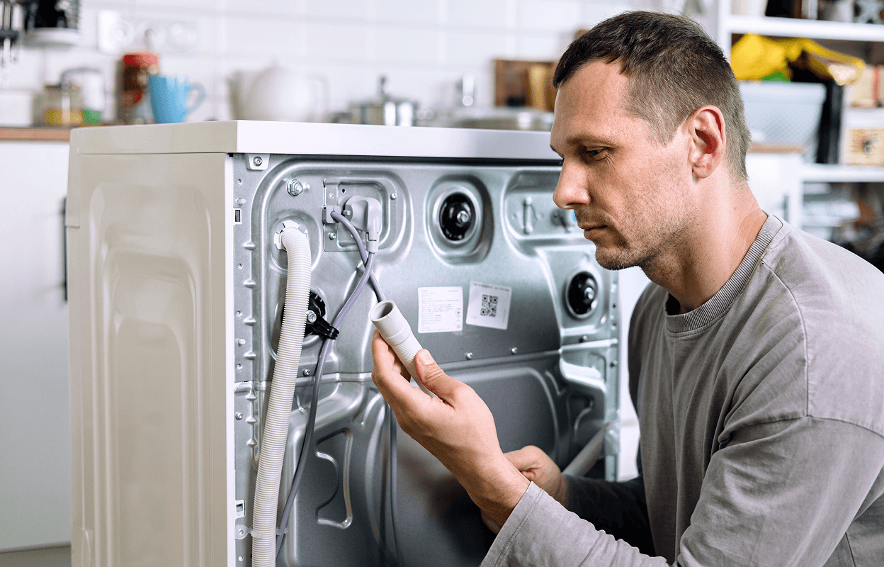 Man fixing washer
