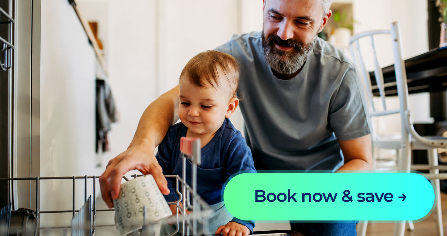 Father and baby load a dishwasher together with a “Book now & save” button.