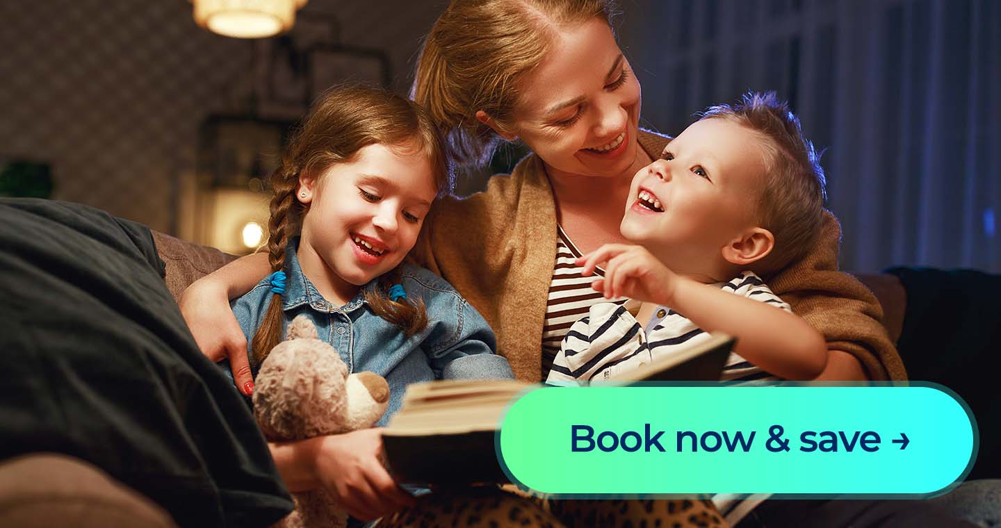 A mother reads with her two children on the couch during a cozy summer evening, with a “Book now & save” call-to-action