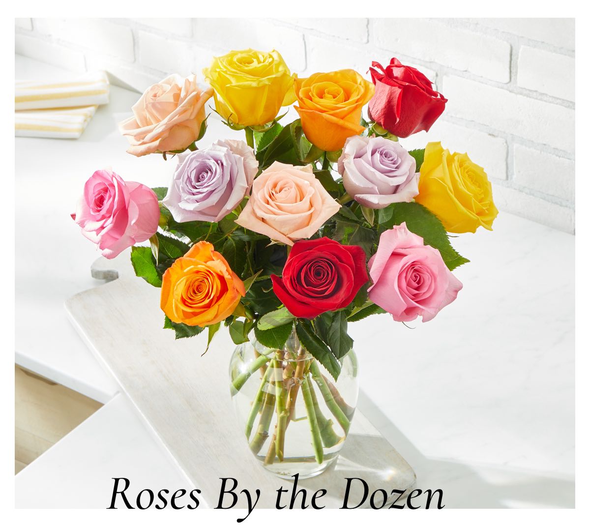 Roses By the Dozen -Shop Now »