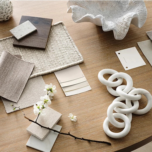 Overlay of color chips, fabric swatches and examples of finishes for interior design.