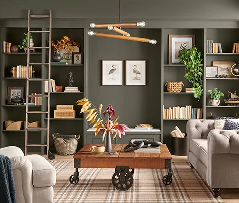 Trendy Living Room painted in Roycroft Bronze Green.