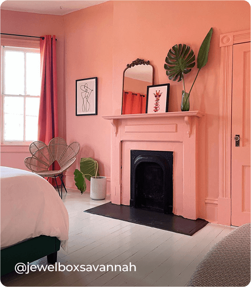 Bedroom with fireplace painted in Rachel Pink. Photo courtesy of @jewelboxsavannah.