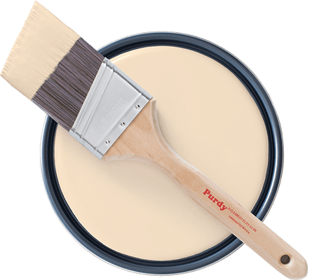 Topview of Purdy brush laying on open paint can showing Napery paint.