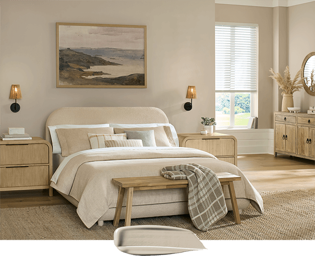 Color swipe overlapping photo of bedroom painted in Shiitake.