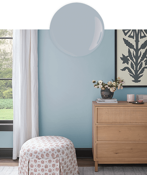 Paint dollop and photo of stylish room, with sideboard and ottoman, painted in Lakeside.