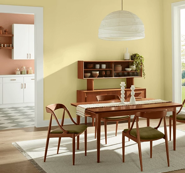 Mid-century modern dining room painted in Icy Lemonade.