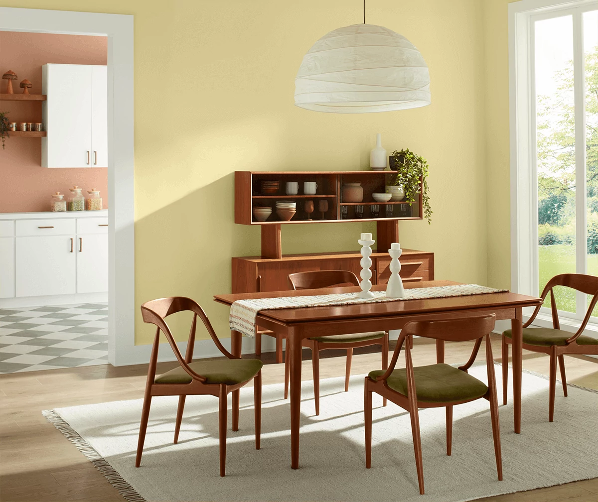 Mid-century modern dining room painted in Icy Lemonade.