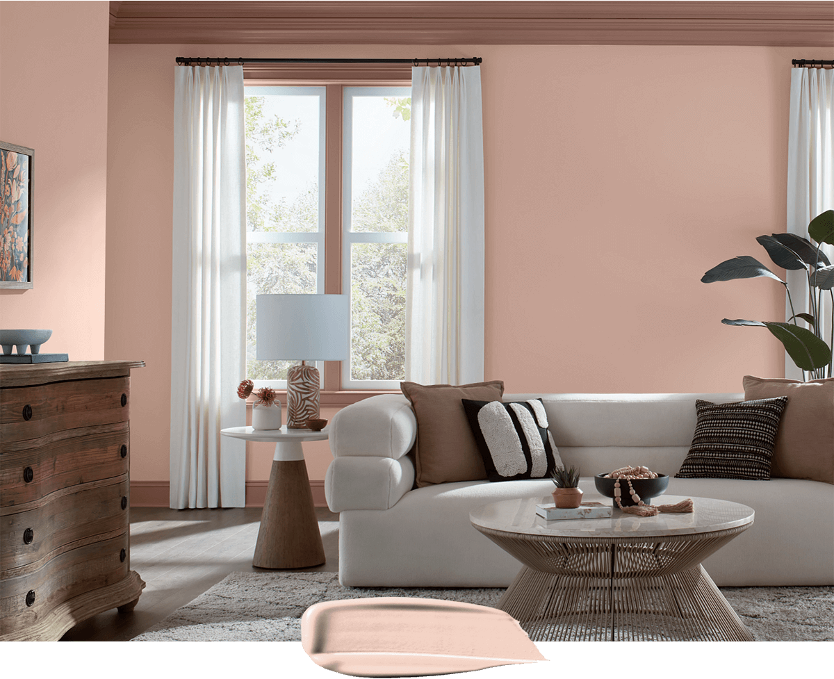 Modern sofa, and furniture in living room painted in Koral Kicks.