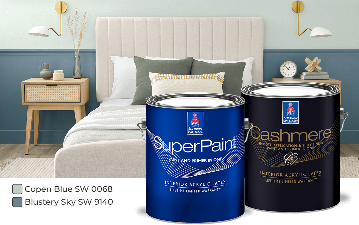 Bedroom, with brass wall sconces flanking bed over bedside tables, painted in Copen Blue and Blustery Sky overlayed with SuperPaint and Cashmere paint cans.
