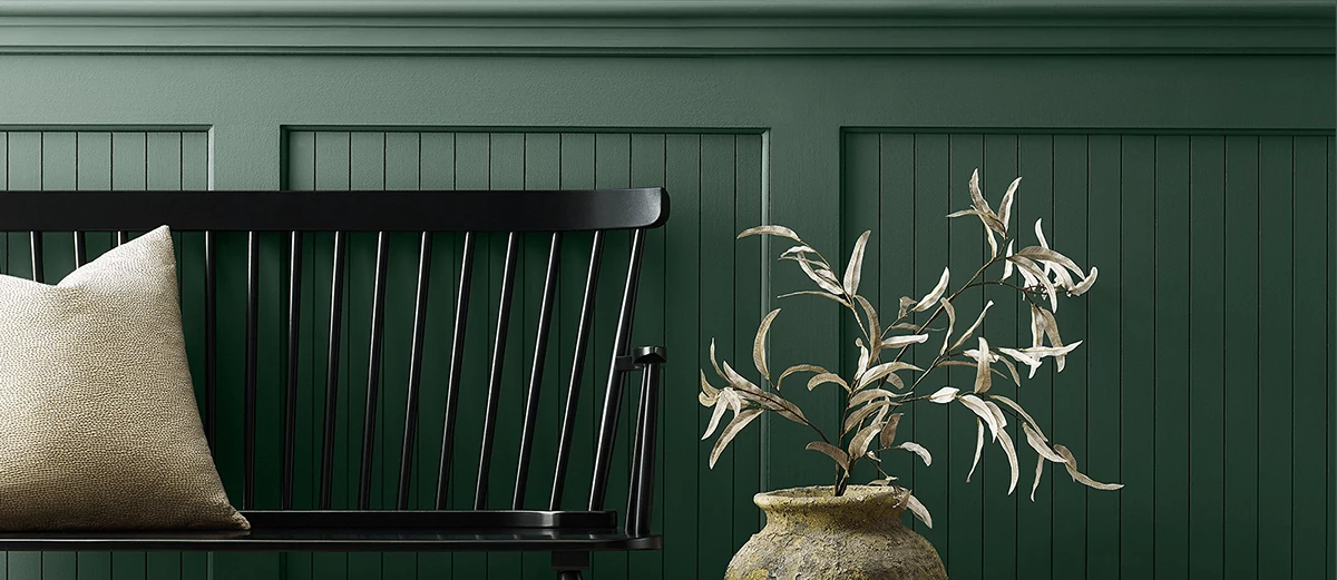 Colonial bench along beadboard wall painted in Billiard Green.